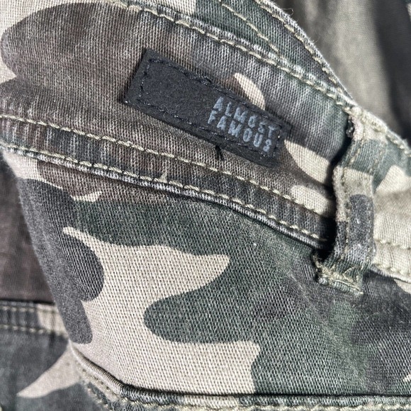 Almost Famous Bib Overall Shorts 9 Green Tan Camo Denim Distressed Shortall - Picture 5 of 8